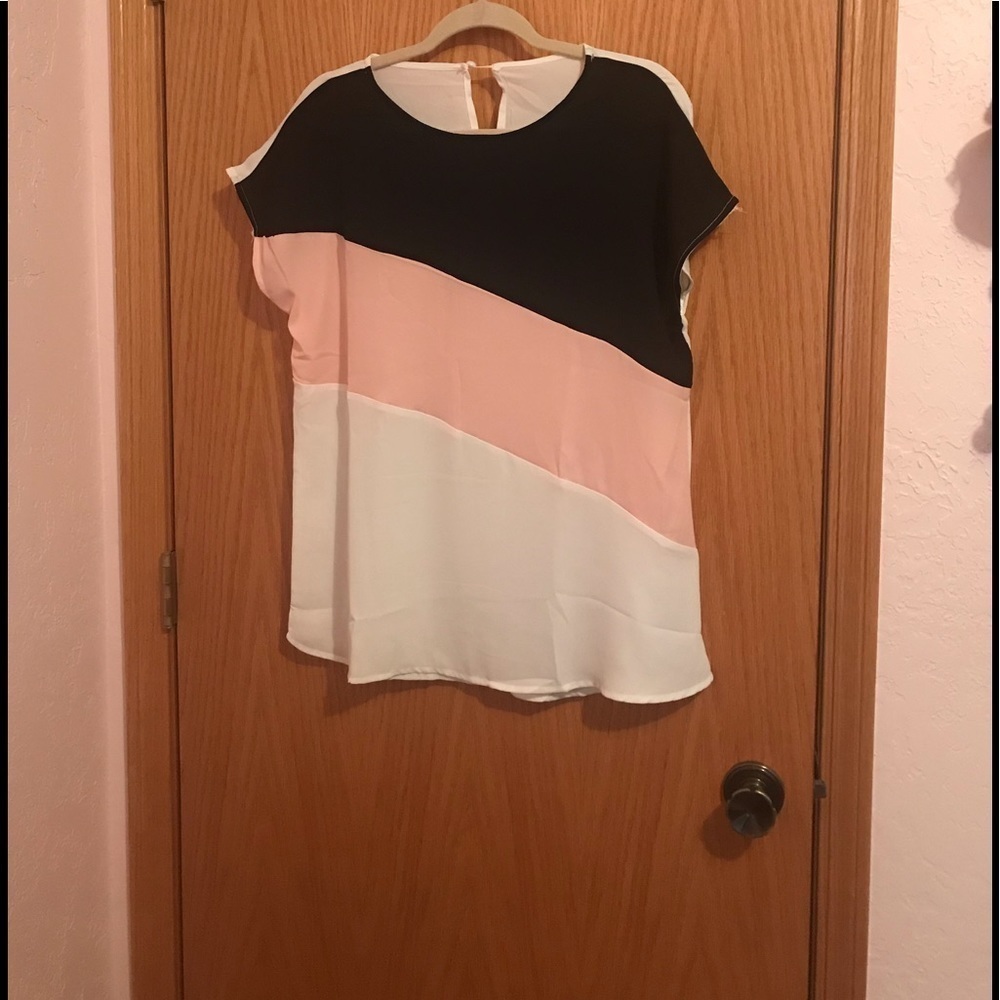 Women’s Top. Black, peachy pink, cream colors.